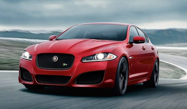 Red Jaguar XF with car mats